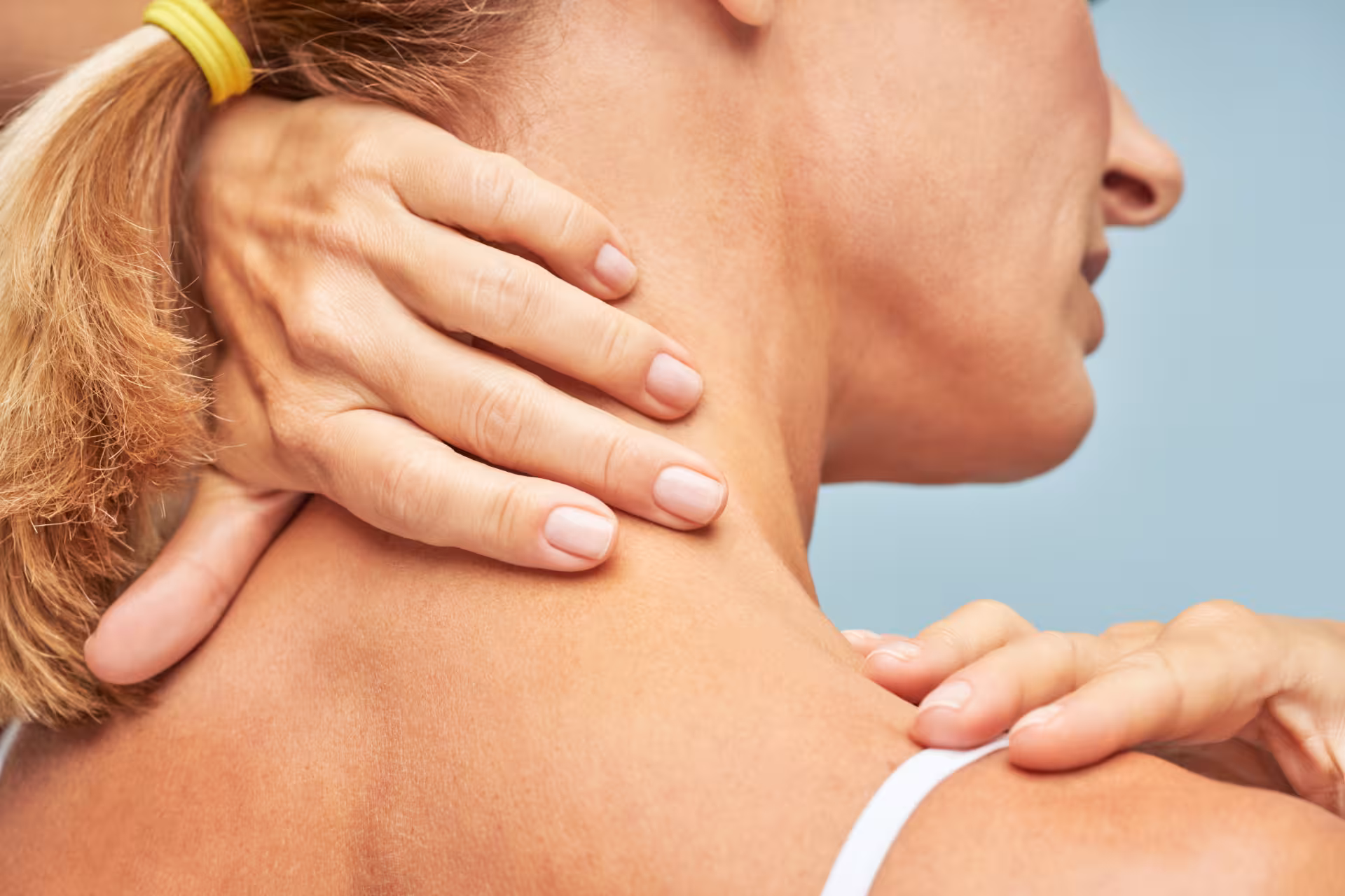 rear view of a mature woman touching her neck and 2025 03 14 21 23 48 utc converted